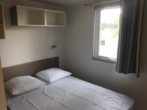 Camping l'Eléphant客房内的一张或多张床位