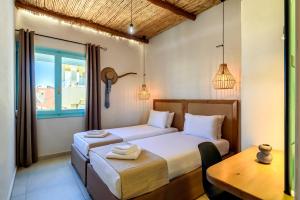 Postel nebo postele na pokoji v ubytování Ilias Apartments