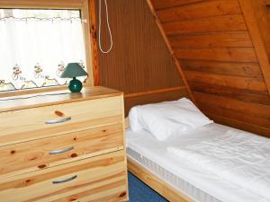 Giường trong phòng chung tại Chalet Nepumuk-2 by Interhome