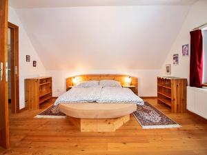 
Ein Bett oder Betten in einem Zimmer der Unterkunft Holiday Home Feichtinger
