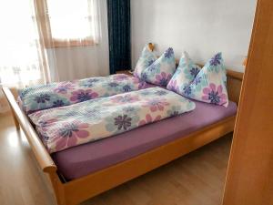 A bed or beds in a room at Apartment Diana by Interhome