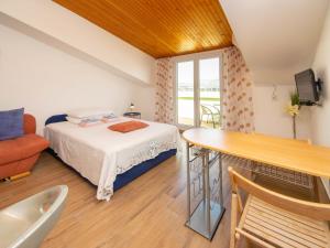 Posteľ alebo postele v izbe v ubytovaní Apartment Šarić-2 by Interhome