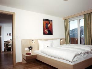 Ένα ή περισσότερα κρεβάτια σε δωμάτιο στο Apartment Ladis-1 by Interhome