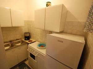 Kuchyň nebo kuchyňský kout v ubytování Apartment Casa Daniela-1 by Interhome