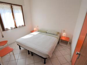 Postel nebo postele na pokoji v ubytování Apartment Casa Daniela-1 by Interhome + 12 fotografií