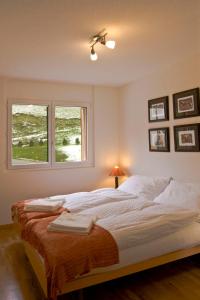 Ένα ή περισσότερα κρεβάτια σε δωμάτιο στο Apartment A31 by Interhome +12 φωτογραφίες