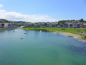 an aerial view of a river with boats in it at Apartment Ederra Untxin by Interhome in Socoa