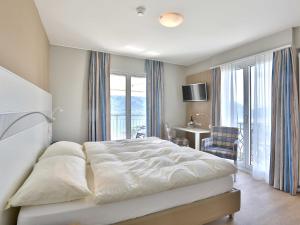 Voodi või voodid majutusasutuse Hotel Stella SA toas