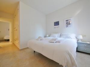Postel nebo postele na pokoji v ubytování Apartamento con piscina en LLAFRANC