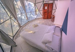 Una cama o camas en una habitación de Cayuco Maya