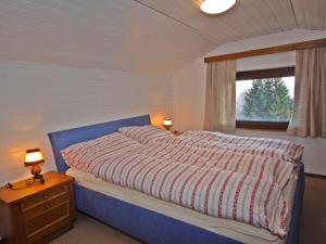 Łóżko lub łóżka w pokoju w obiekcie Holiday Home Lotte by Interhome