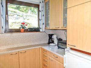 Kuchnia lub aneks kuchenny w obiekcie Holiday Home Lotte by Interhome