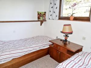 Łóżko lub łóżka w pokoju w obiekcie Holiday Home Lotte by Interhome