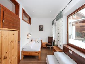 Voodi või voodid majutusasutuse Apartment Tyrol-2 by Interhome toas