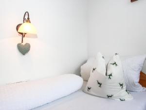 Voodi või voodid majutusasutuse Apartment Tyrol-2 by Interhome toas