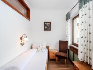 Voodi või voodid majutusasutuse Apartment Tyrol-2 by Interhome toas