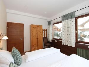 Voodi või voodid majutusasutuse Apartment Tyrol-2 by Interhome toas