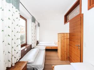 Voodi või voodid majutusasutuse Apartment Tyrol-2 by Interhome toas