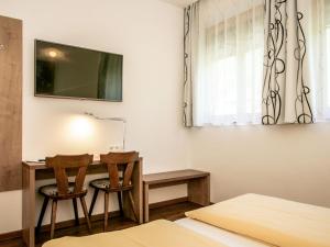 TV a/nebo společenská místnost v ubytování Apartment Hochjoch by Interhome