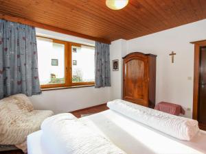 Voodi või voodid majutusasutuse Apartment Tyrol-1 by Interhome toas