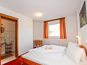 Postel nebo postele na pokoji v ubytování Apartment Sailer by Interhome