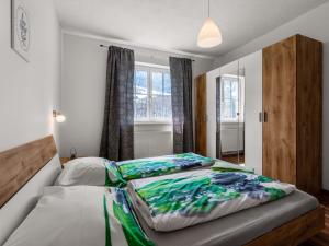 Postel nebo postele na pokoji v ubytování Apartment Achtalgut by Interhome
