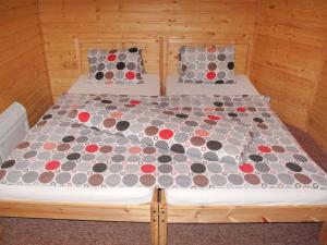 Postel nebo postele na pokoji v ubytování Holiday Home Lenora I by Interhome