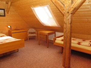 Postel nebo postele na pokoji v ubytování Holiday Home Lenora I by Interhome