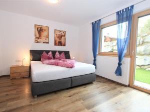 Postel nebo postele na pokoji v ubytování Apartment Wildbachl by Interhome