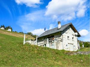 an old stone building on a hill with a sky at Holiday Home Baita Ficc by Interhome in Leontica