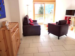 TV a/nebo společenská místnost v ubytování Apartment Ardévine 5 by Interhome