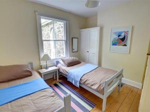 Ein Bett oder Betten in einem Zimmer der Unterkunft Holiday Home Bontddu by Interhome