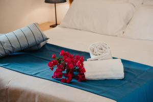Posteľ alebo postele v izbe v ubytovaní Hotel Rojas