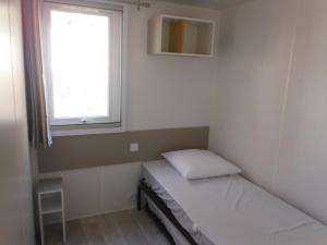 Camping l'Eléphant客房内的一张或多张床位