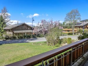 a view of a street from a balcony of a house at Studio La Bercière 7 by Interhome in Villars-sur-Ollon