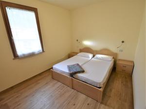 Łóżko lub łóżka w pokoju w obiekcie Apartment Elettra-7 by Interhome