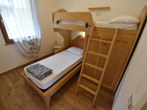 Łóżko lub łóżka w pokoju w obiekcie Apartment Elettra-7 by Interhome