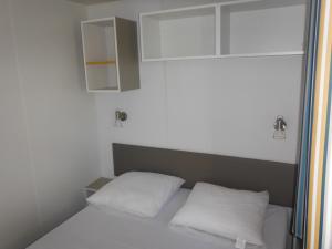 Postel nebo postele na pokoji v ubytování Camping l'Eléphant
