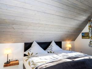 Krevet ili kreveti u jedinici u okviru objekta Chalet Felsenhütte by Interhome