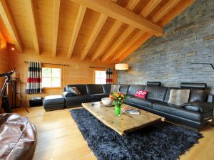 A seating area at Chalet Chalet Maurice by Interhome