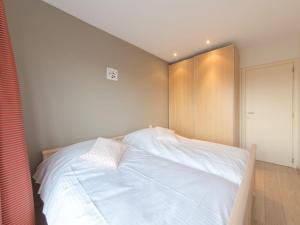 Postel nebo postele na pokoji v ubytování Apartment Seaside 4-02 by Interhome