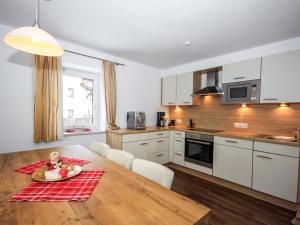 A kitchen or kitchenette at Apartment Schloßmühle by Interhome