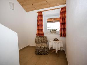 A seating area at Apartment Schloßmühle by Interhome