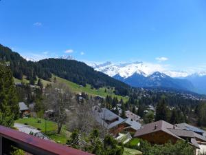 a view of a valley with snow covered mountains at Apartment Savoie 1 by Interhome in Villars-sur-Ollon