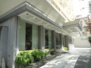 an external view of a building at Regency Hotel Malabar Hill in Mumbai