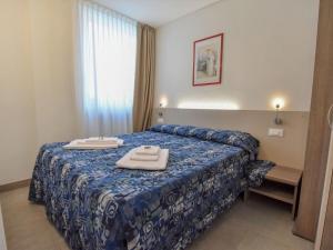 Postel nebo postele na pokoji v ubytování Apartment Kristall-11 by Interhome