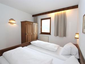 Posteľ alebo postele v izbe v ubytovaní Apartment Römerhof-2 by Interhome