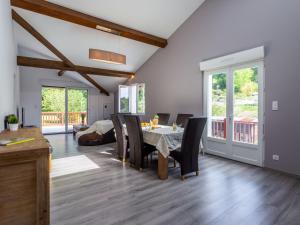 a dining room with a table and chairs at Apartment Maison Elbarren by Interhome in Urrugne