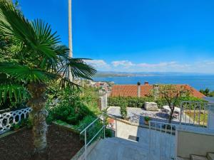 a view of the ocean from the balcony of a house at Holiday Home Bono by Interhome in Opatija
