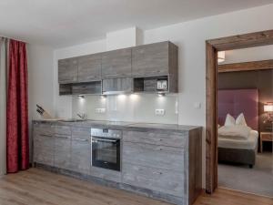 Kuchyňa alebo kuchynka v ubytovaní Apartment Melisande 2 by Interhome